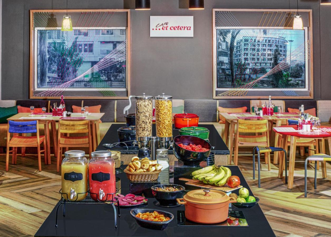 Ginger Dwarka Hotel Bagian luar foto